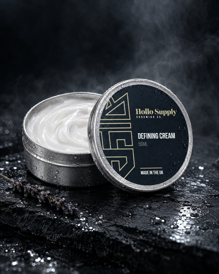 Defining Cream (50ml) by Hollo Supply Grooming Co., photographed on wet charcoal stone with water