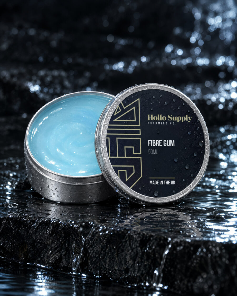 Fibre Gum (50ml) by Hollo Supply Grooming Co., photographed on wet charcoal stone with water