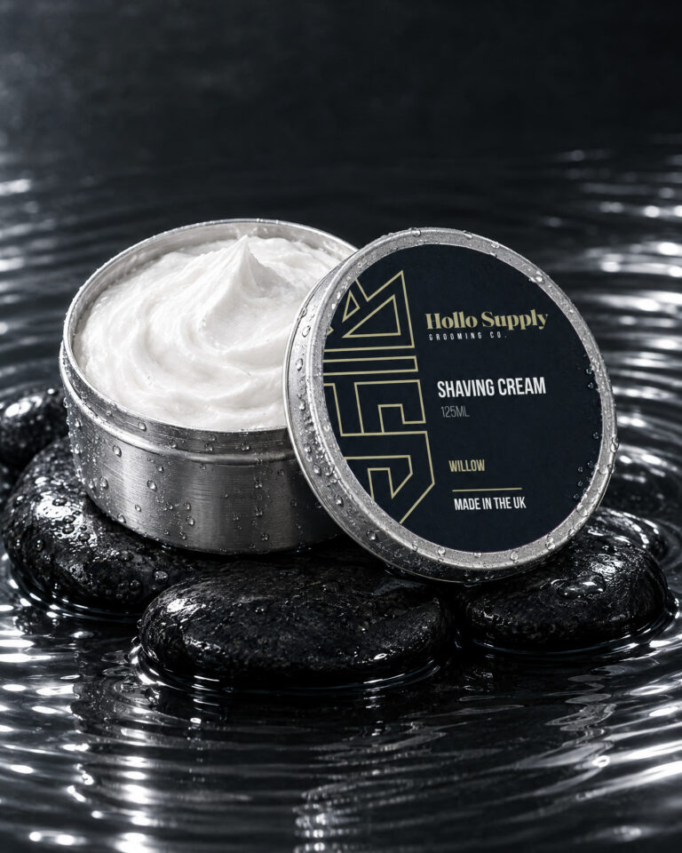 Shaving Cream (Willow) by Hollo Supply Grooming Co., photographed on wet charcoal stone with water