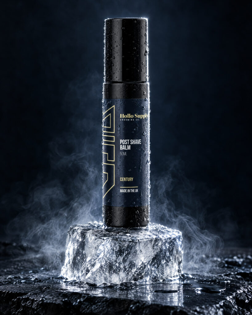 Post Shave Balm (Century) by Hollo Supply Grooming Co., photographed on wet charcoal stone with water