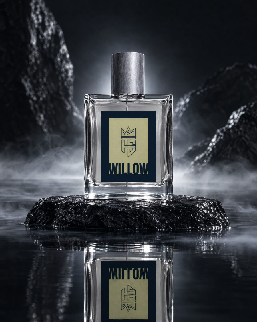Willow Cologne by Hollo Supply Grooming Co., photographed on wet charcoal stone with water