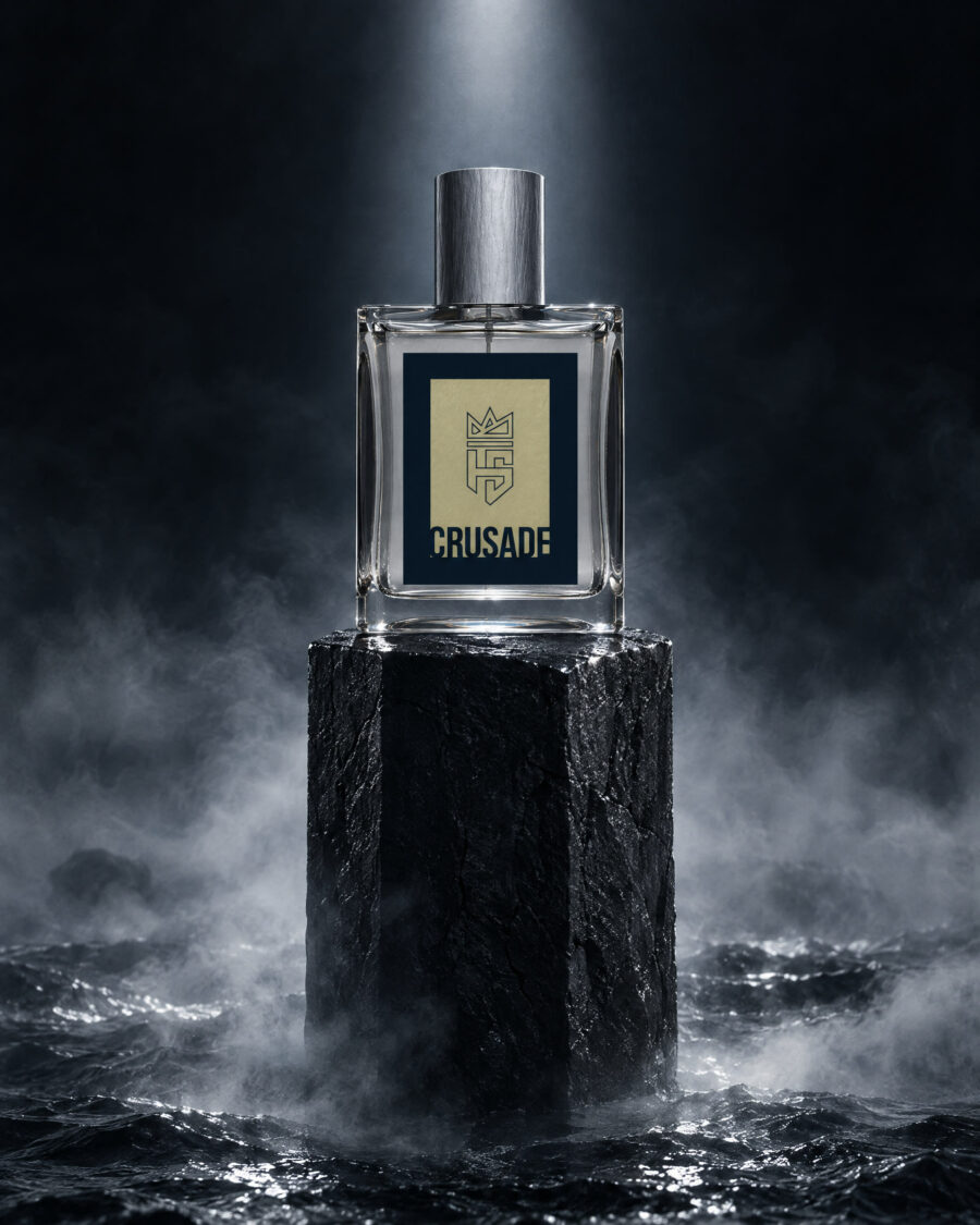 Crusade Eau De Parfum by Hollo Supply Grooming Co., photographed on wet charcoal stone with water