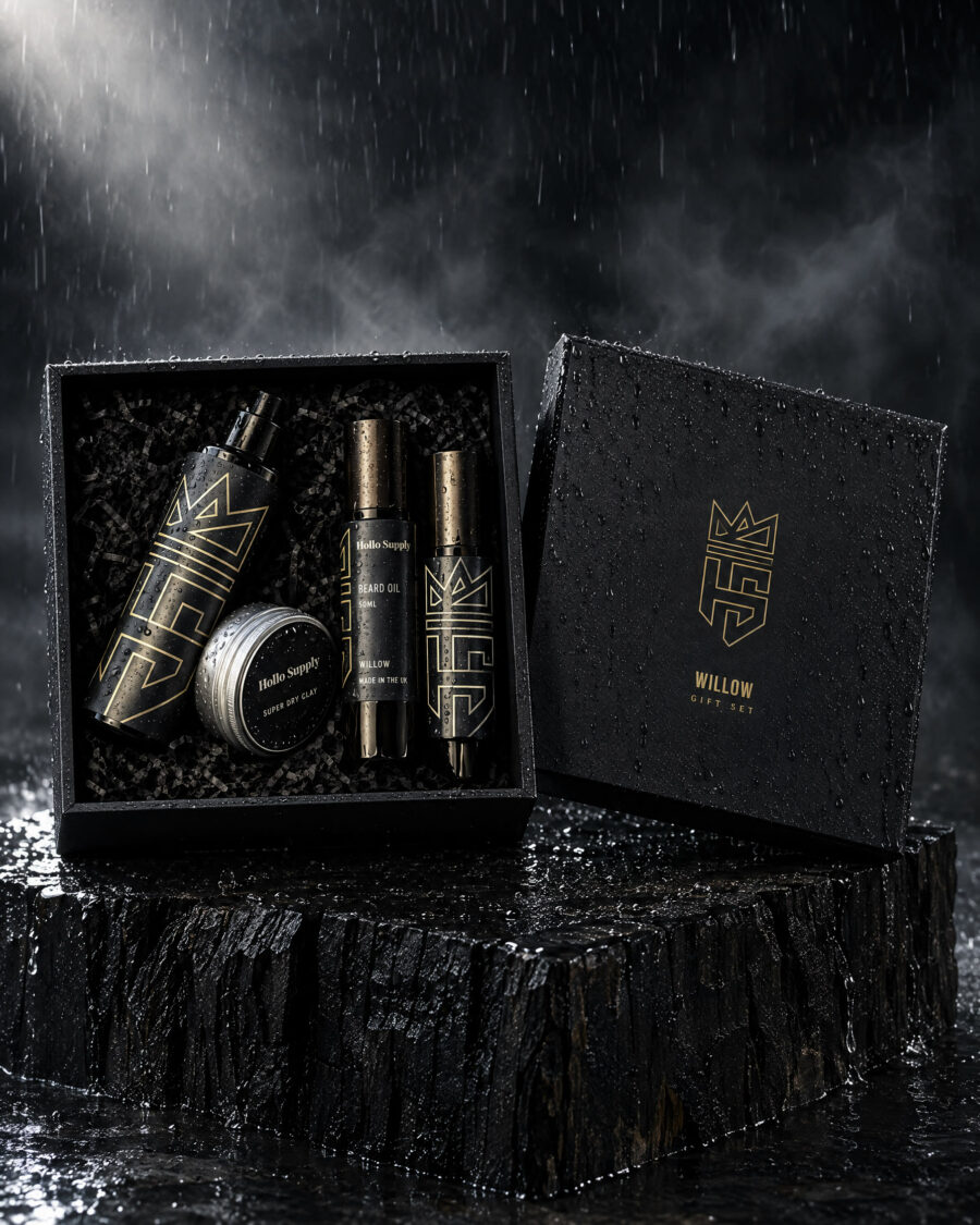 The Willow Gift Set by Hollo Supply Grooming Co., photographed on wet charcoal stone with water